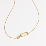 Change halskæde i guld med elegante detaljer