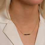 Smuk halskæde til kvinder i guld med sorte rådiamanter