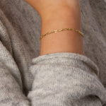 Klassisk armbånd i guld til kvinder