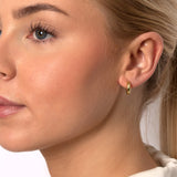 Tykke hoops øreringe til kvinder i guld